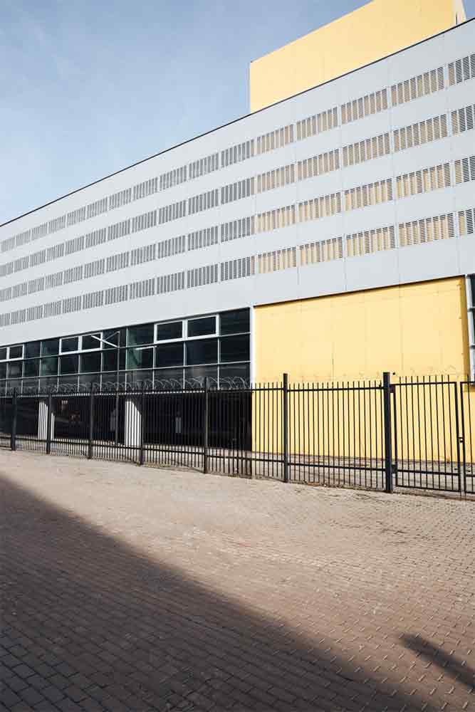 fence against a office building